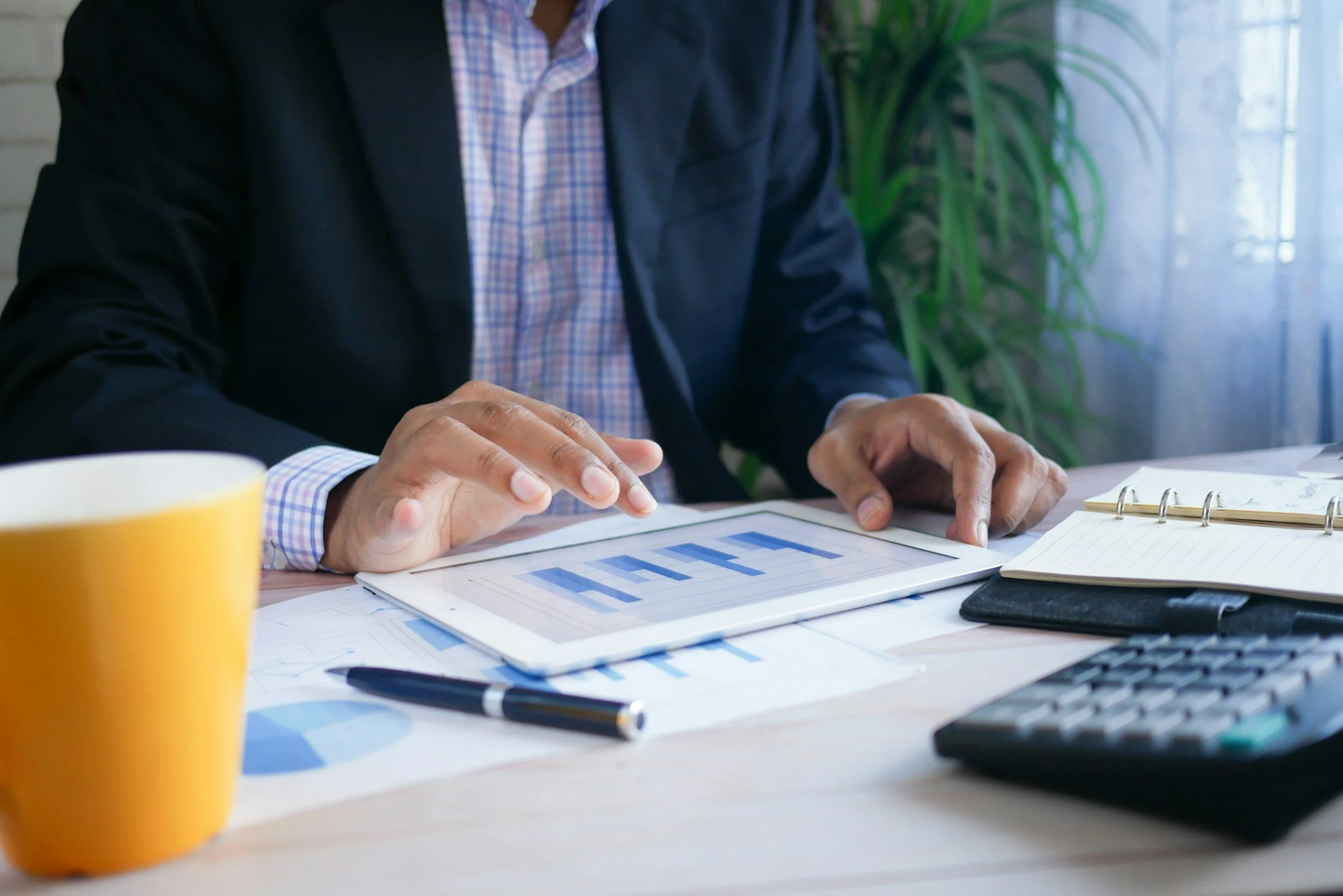 Business documents and calculator.